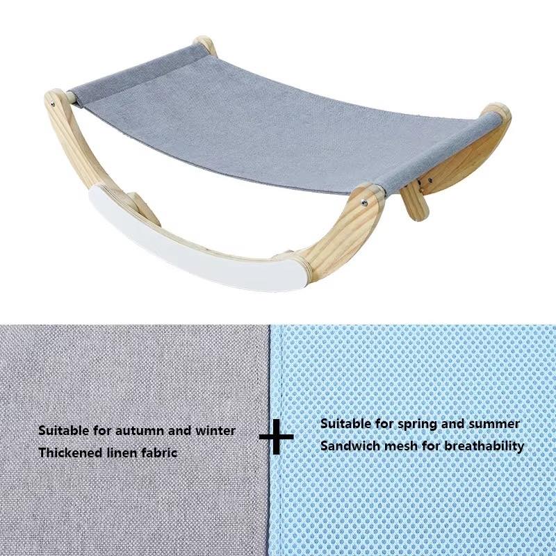 A curved pet hammock with a gray fabric sling and natural wood frame, shown above a split fabric detail graphic labeled for autumn/winter thickened linen fabric and spring/summer sandwich mesh.