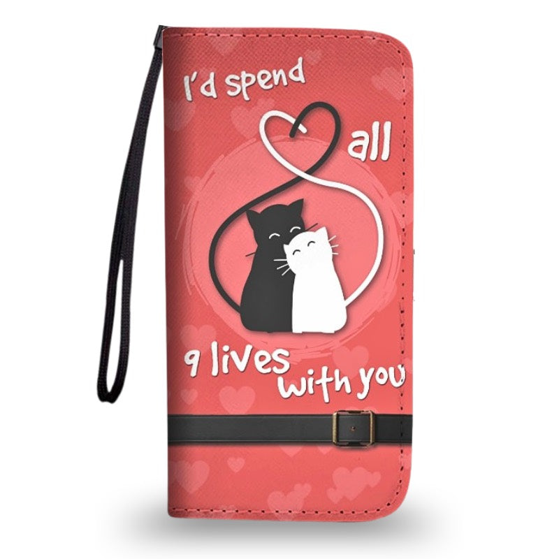 Red clutch purse, with two cats design and text 'I'd spend all 9 lives with you', on a white background