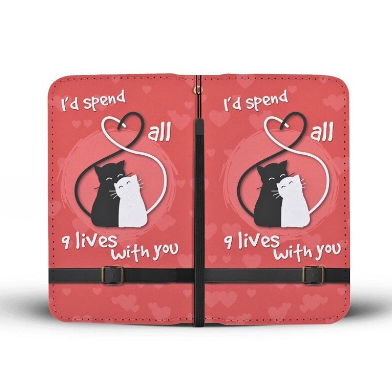 Front and back view of a red clutch purse featuring a cat design and ‘I’d spend all 9 lives with you’ text on a white background