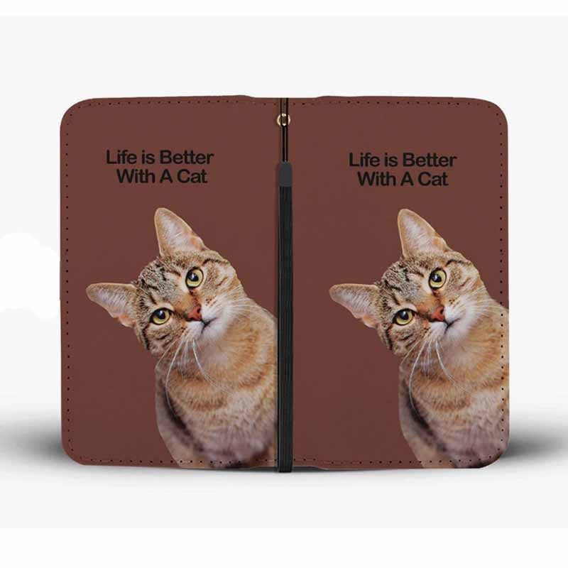 Brown purse showing both sides, featuring a cat design and 'Life is Better With A Cat' text, on a white background