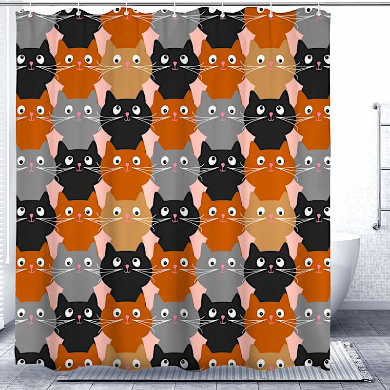 Shower curtain with a pattern of stylized cats in various colors, displayed in a bathroom