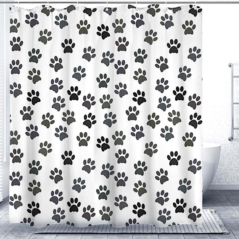 Shower curtain with black paw print pattern on a white background