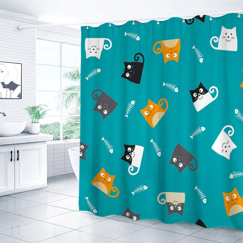 Shower curtain with cat pattern in a bathroom
