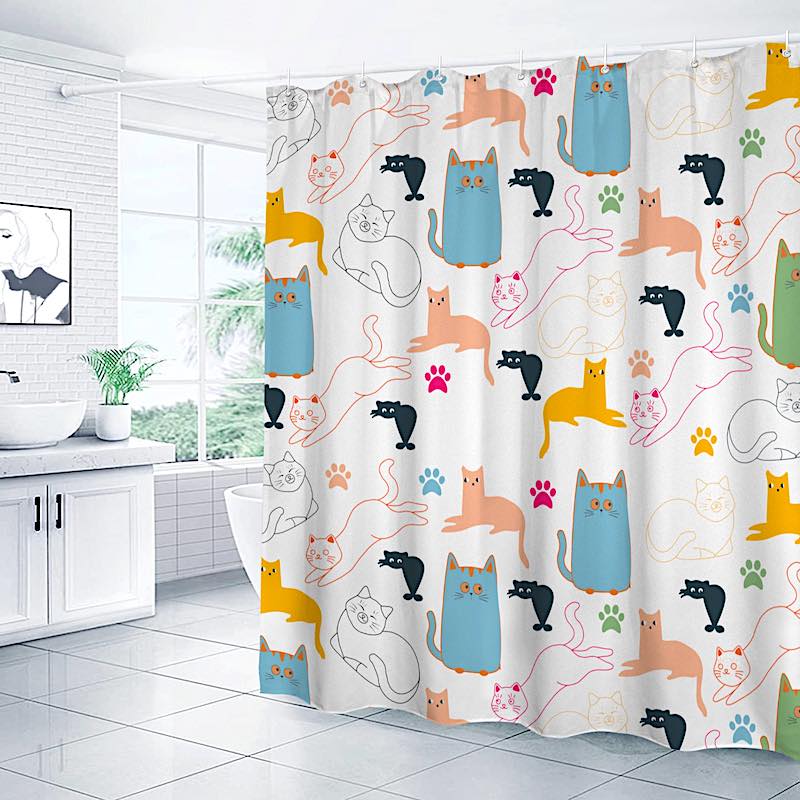 Shower curtain with colorful cat pattern in a bathroom setting