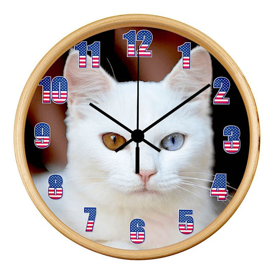 Wall clock with a cat's face and American flag numbers, natural wood frame, black hand, on a white background