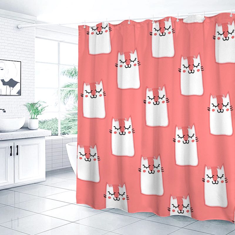 Pink shower curtain with white cat pattern in a bathroom setting