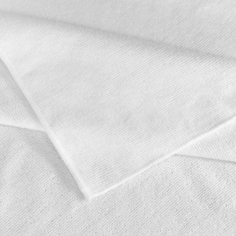 Close-up of white fabric with a subtle texture