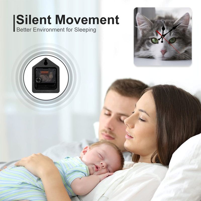 Couple with a baby sleeping peacefully, with a clock showing a cat's face in the corner.
