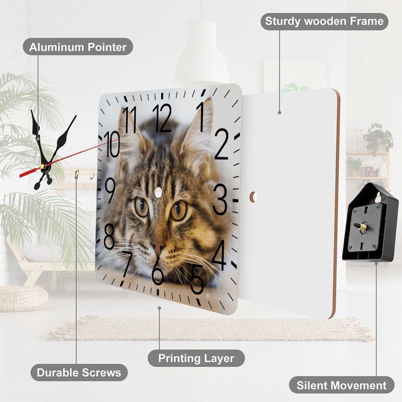 Wall clock with a cat design, labeled features on a white background